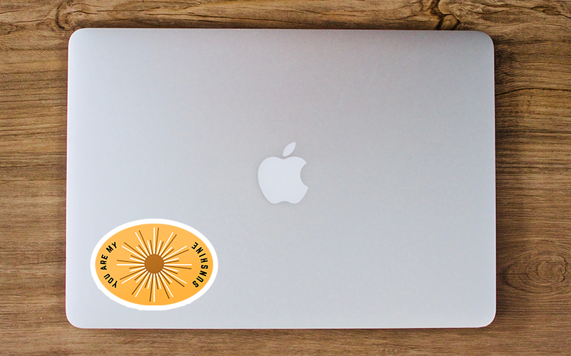 you are my sunshine oval sticker on closed apple MacBook