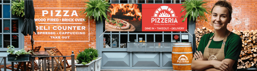 Happy customer outside of pizzeria with hanging business banner